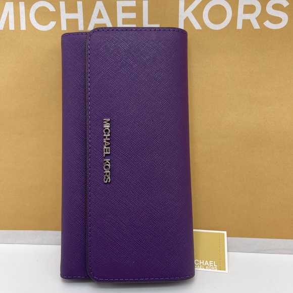 Michael Kors Handbags - Michael Kors Lg Jet Set Travel Trifold Leather Wallet 
Dark Purple 
NWT